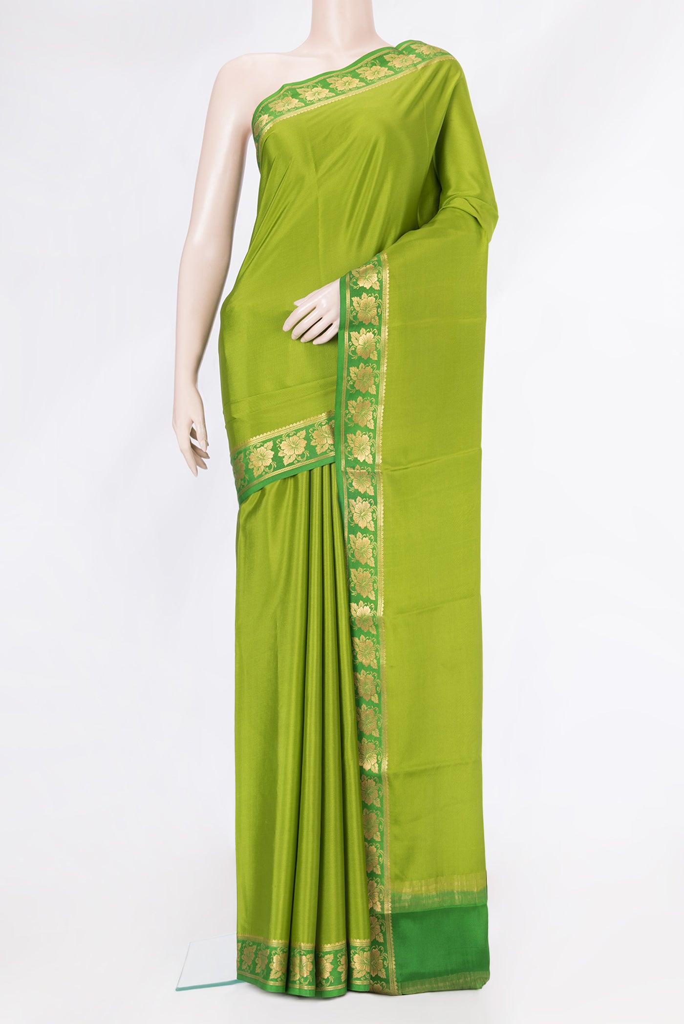 Parrot Green Dual Tone Mysore Silk Saree with Plain Body and Zari Border.  displayed on a mannequin