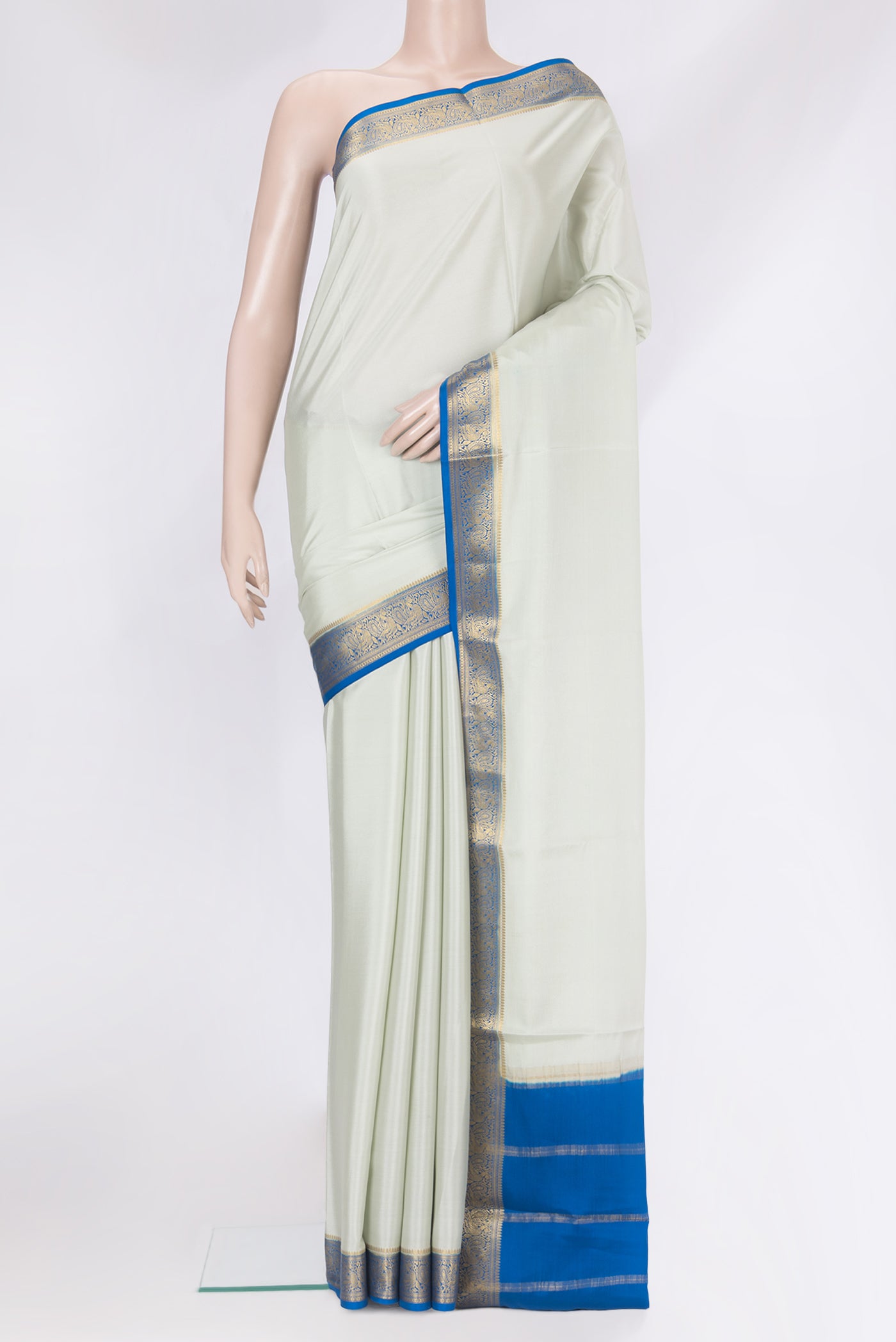 Grey Mysore Silk Saree with Plain Body and Zari Border.  displayed on a mannequin