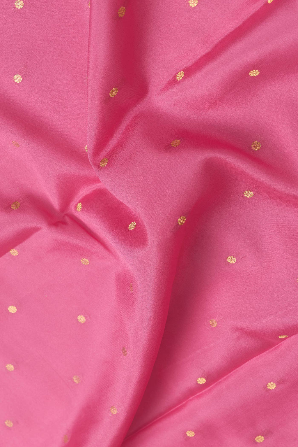 Close up of Pink Dual Tone Mysore Silk Saree with Zari Butta on the body and Zari Border.  displaying folds