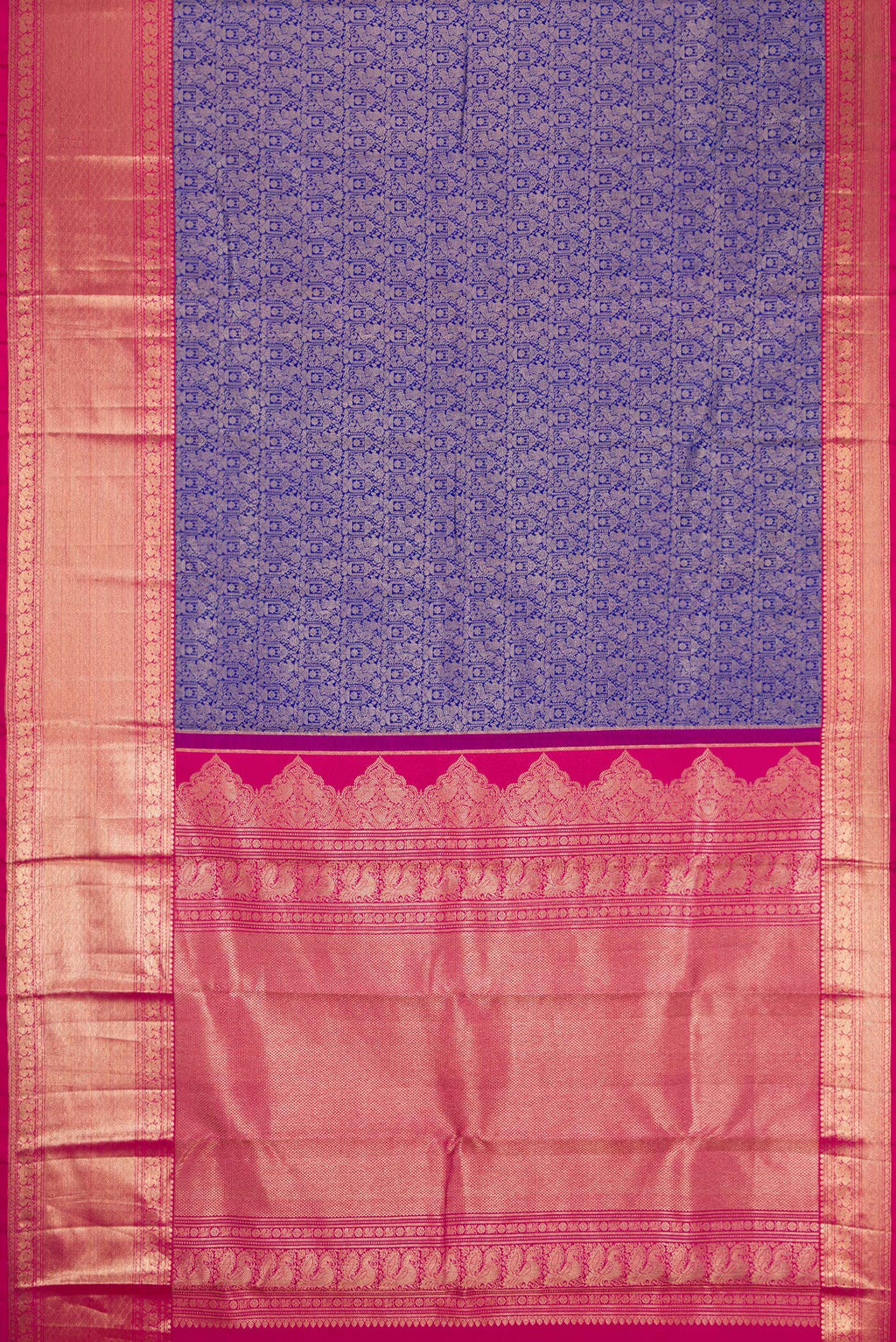 Flat view of Royal Blue Dual Tone Kanjivaram Silk Saree with Zari Brocade on the body and Zari Border. 