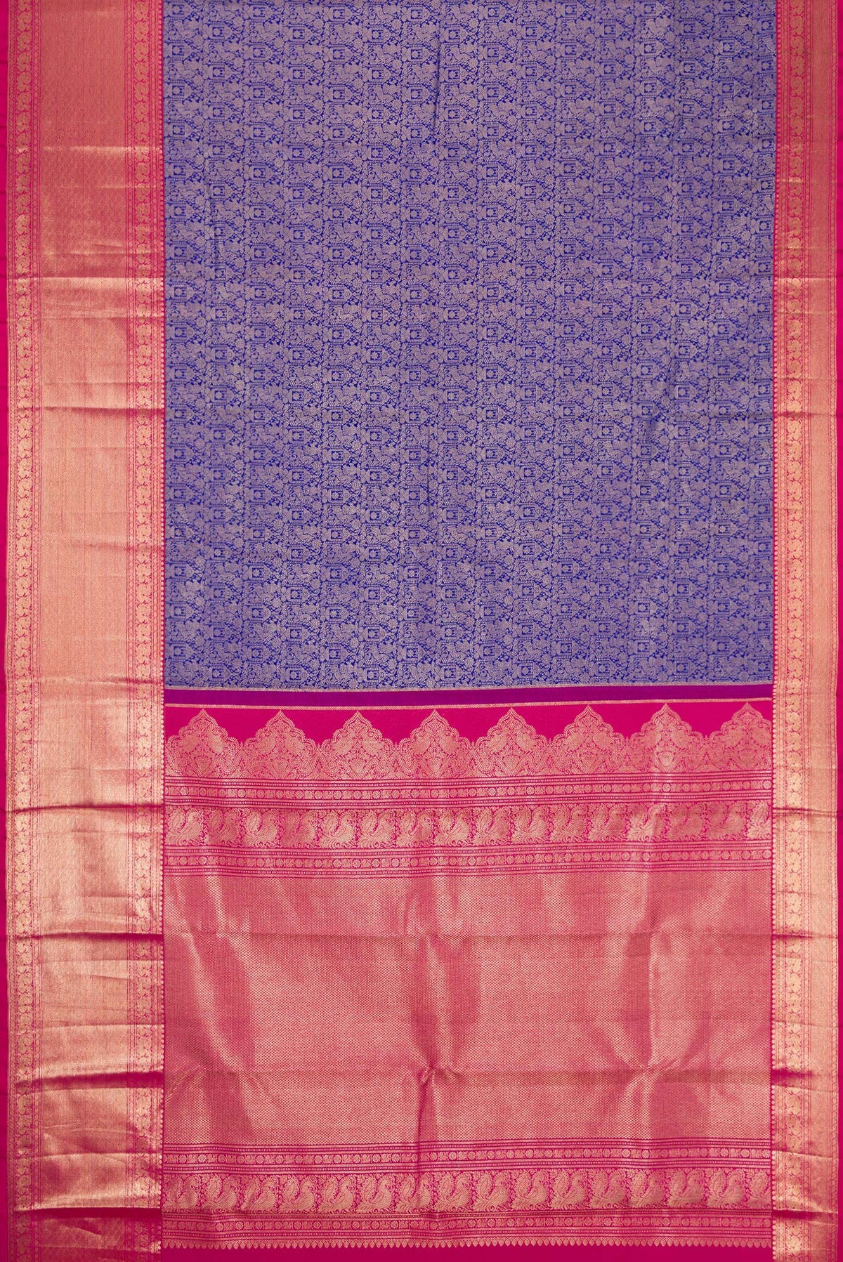 Flat view of Royal Blue Dual Tone Kanjivaram Silk Saree with Zari Brocade on the body and Zari Border. 