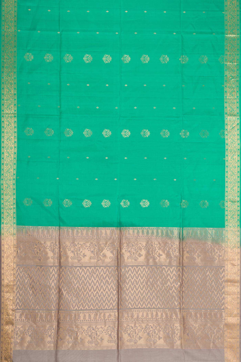 Flat view of Sea Green Dual Tone Soft Silk Saree with Zari Butta on the body and Zari Border. 
