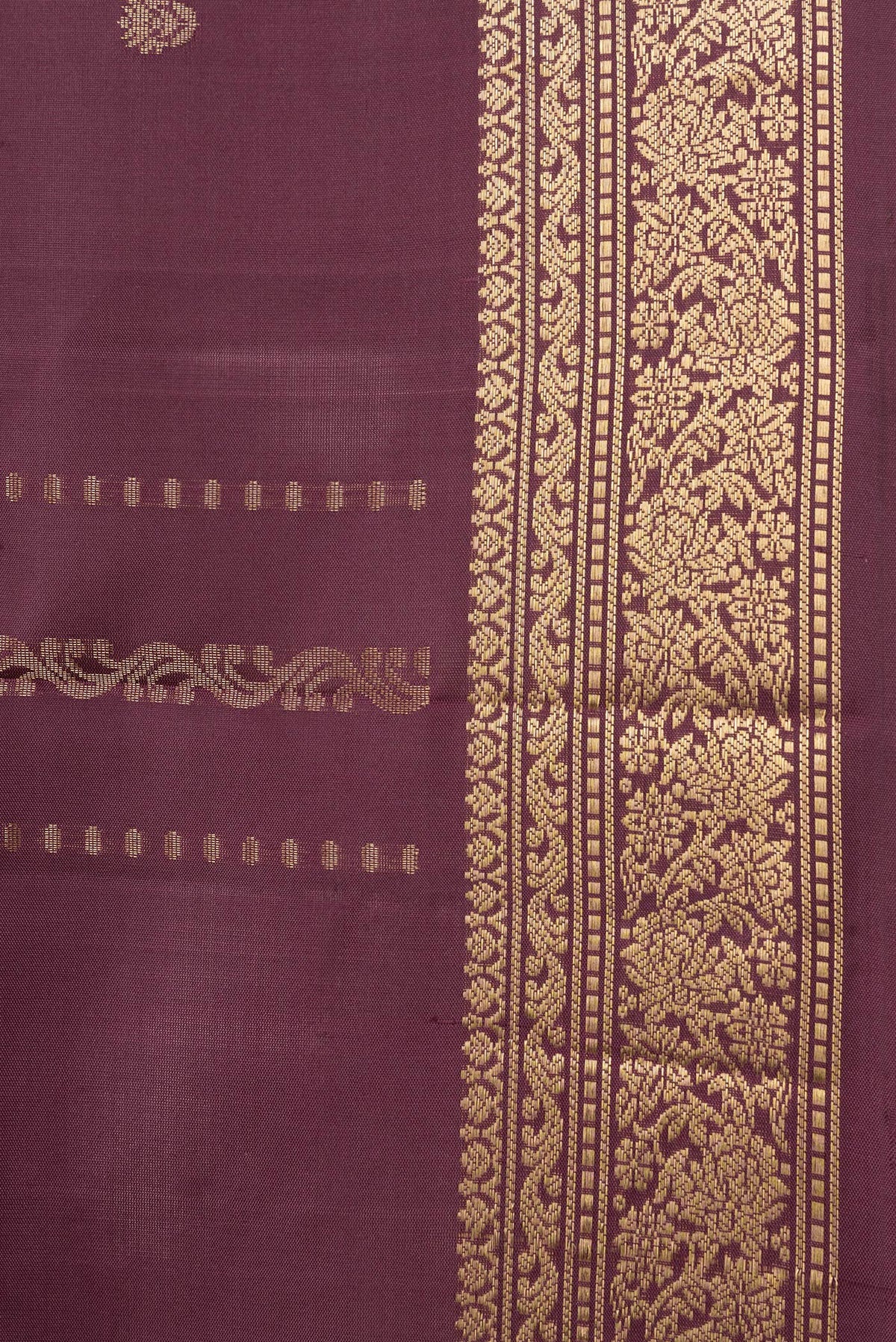 Border image of Maroon Dual Tone Soft Silk Saree with Zari Butta on the body and Zari Border. 