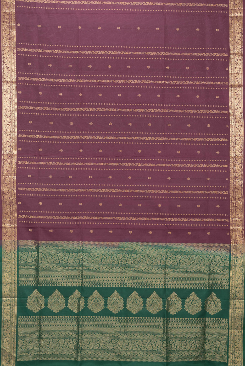 Flat view of Maroon Dual Tone Soft Silk Saree with Zari Butta on the body and Zari Border. 
