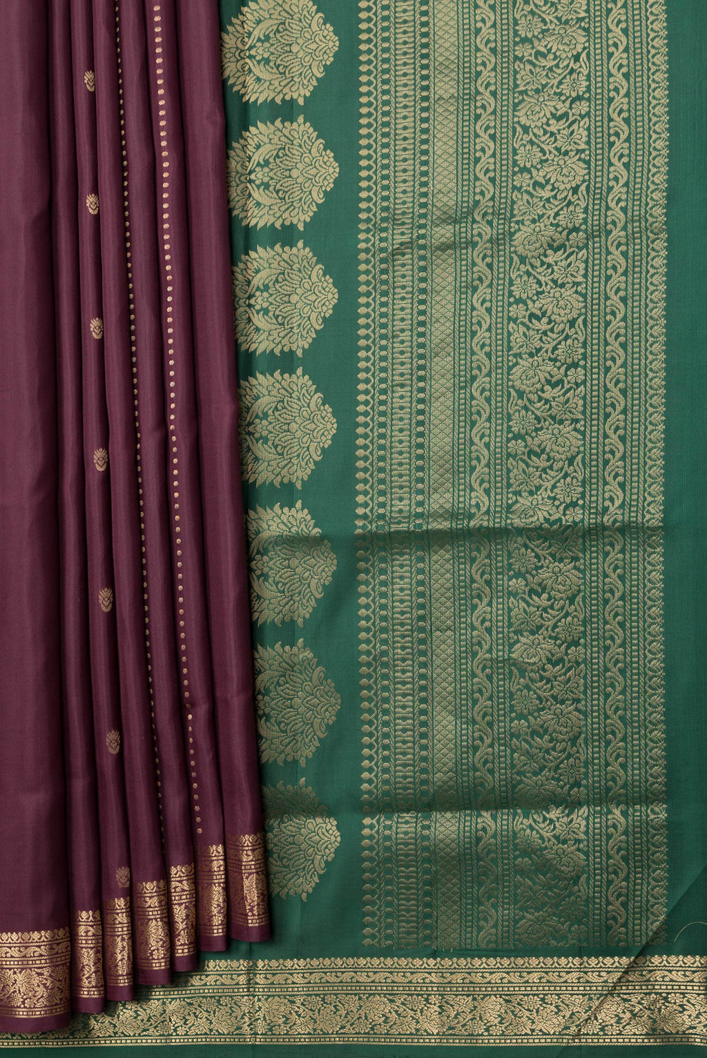 Pleats and pallu of Maroon Dual Tone Soft Silk Saree with Zari Butta on the body and Zari Border. 