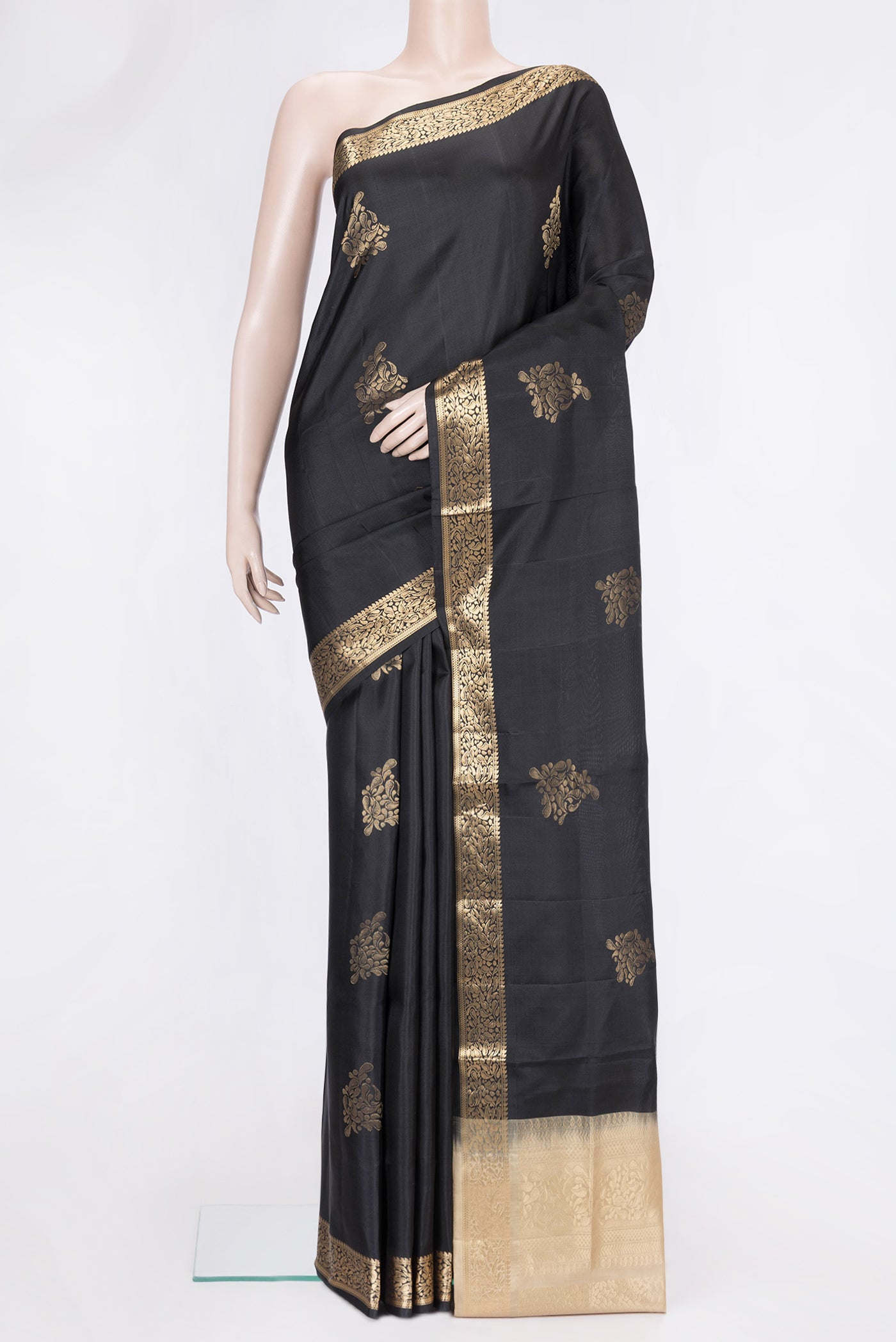 Black Dual Tone Soft Silk Saree with Zari Butta on the body and Zari Border.  displayed on a mannequin