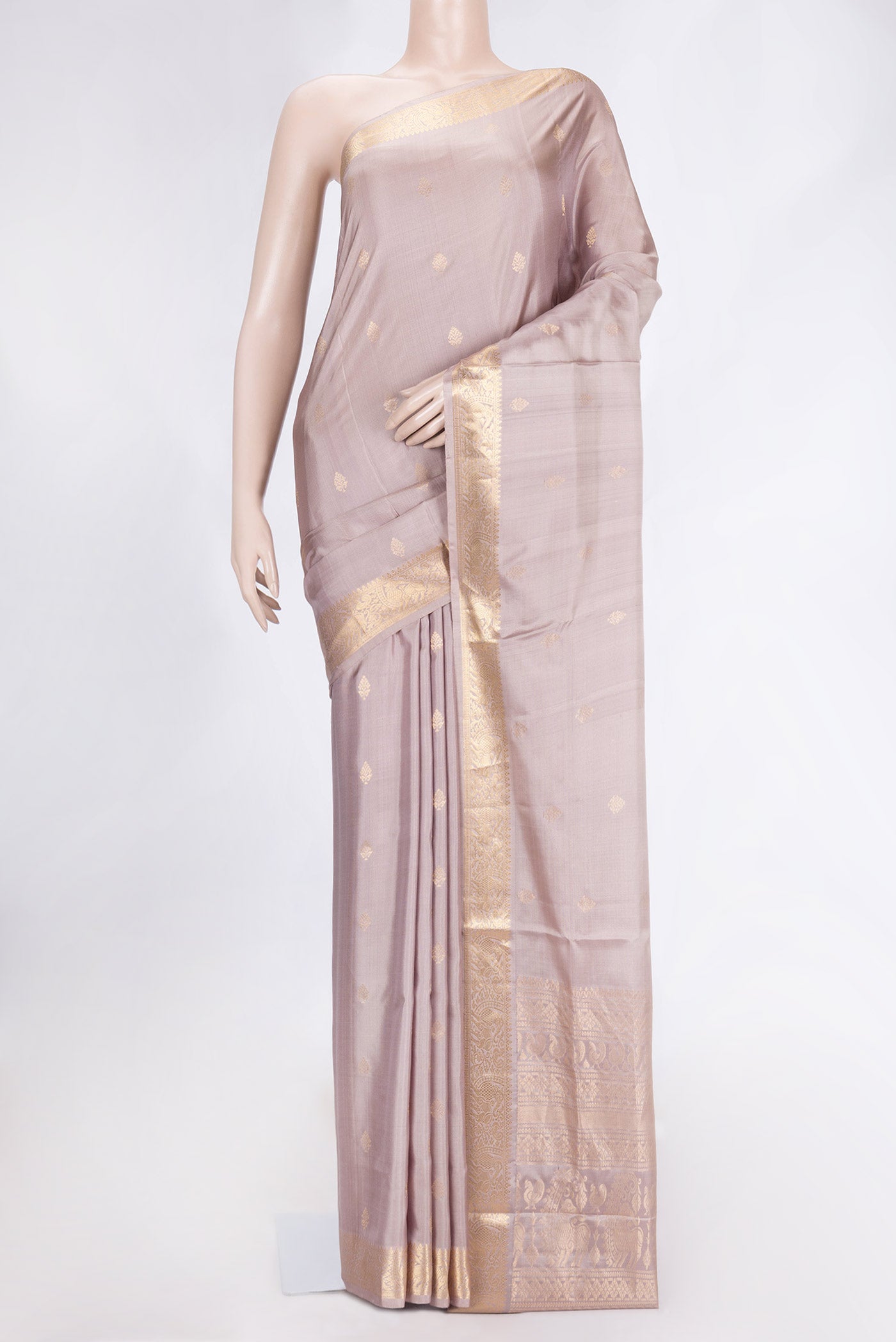 Rose Gold Dual Tone Soft Silk Saree with Zari Butta on the body and Zari Border.  displayed on a mannequin