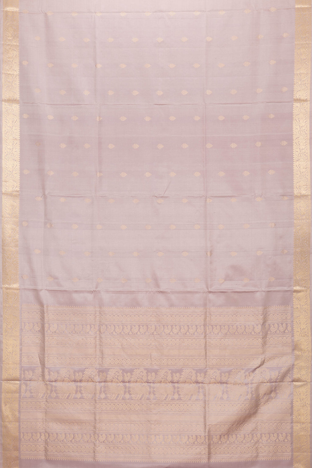 Flat view of Rose Gold Dual Tone Soft Silk Saree with Zari Butta on the body and Zari Border. 