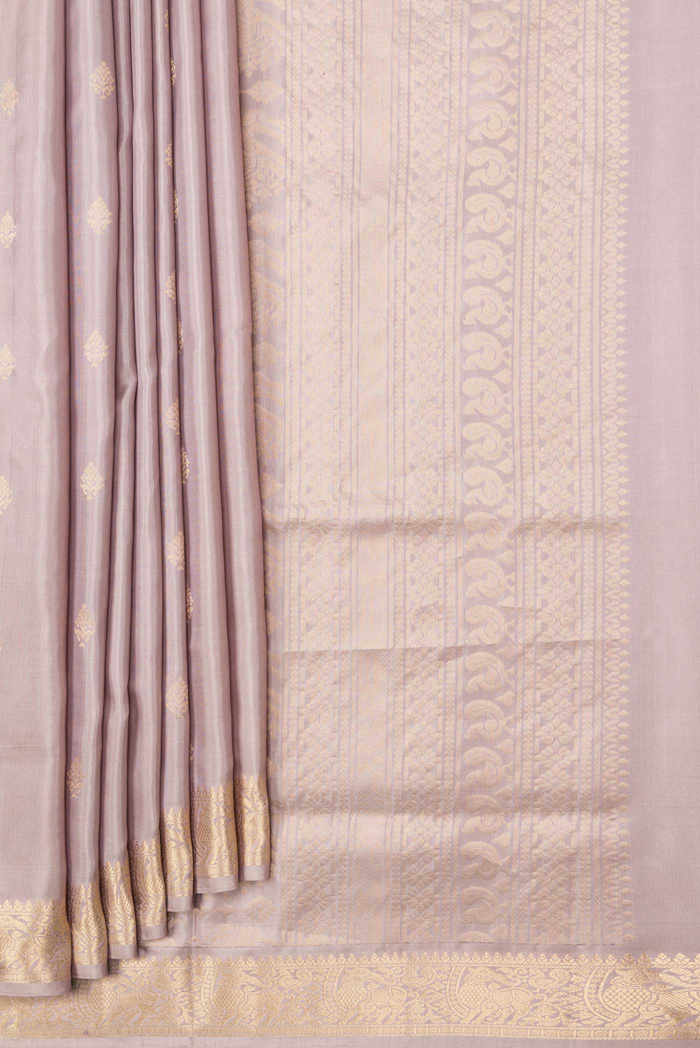 Pleats and pallu of Rose Gold Dual Tone Soft Silk Saree with Zari Butta on the body and Zari Border. 