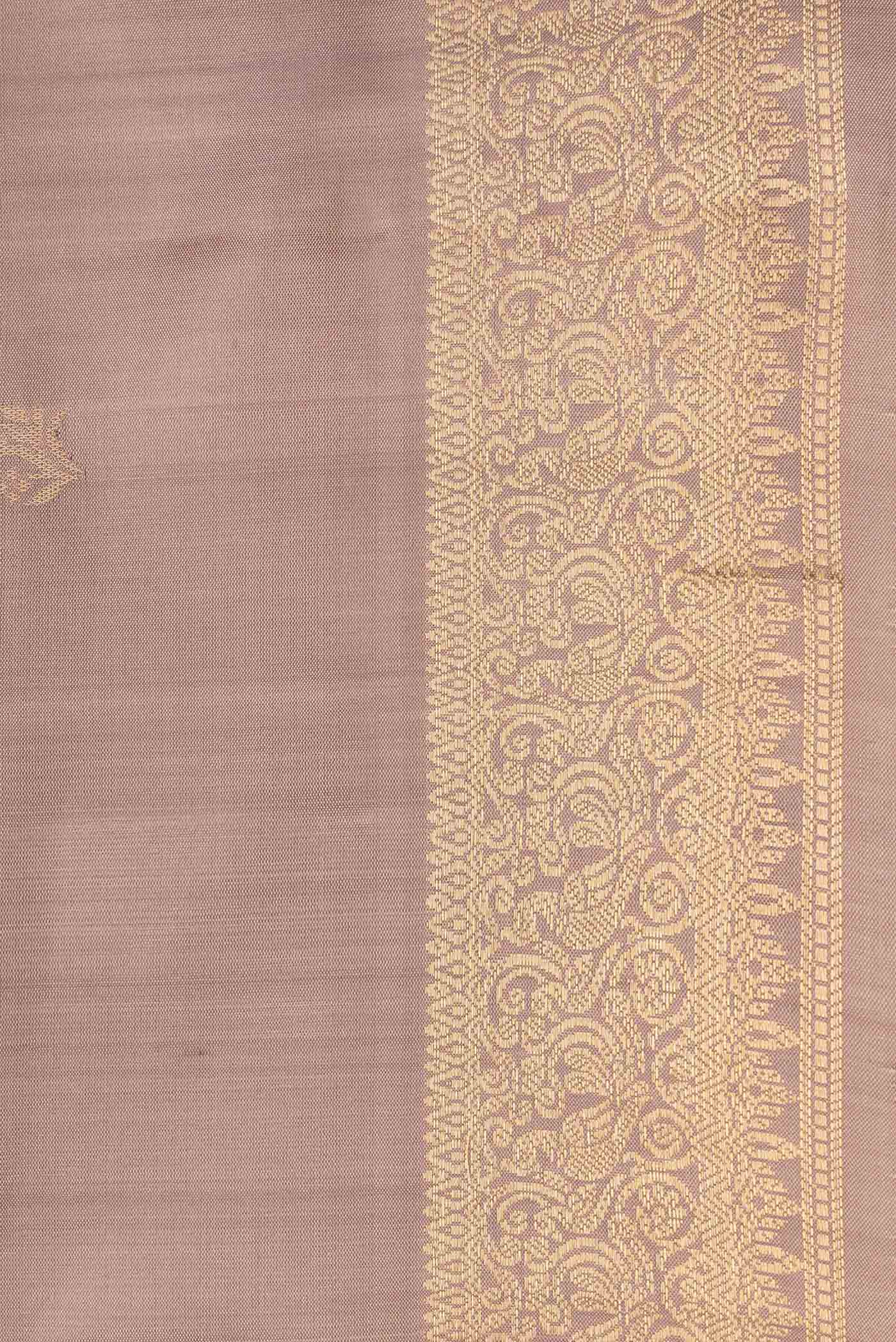 Border image of Beige Dual Tone Soft Silk Saree with Zari Butta on the body and Zari Border. 