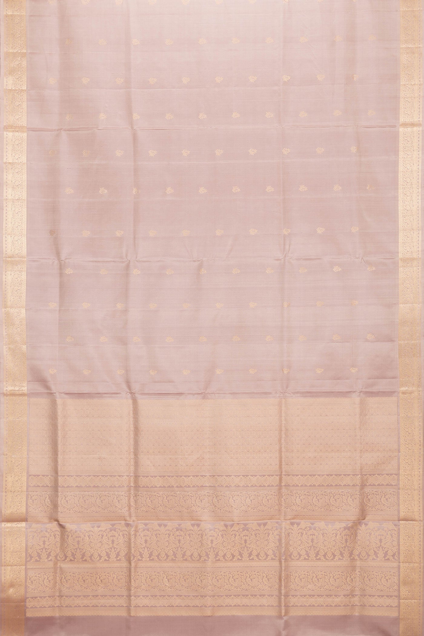 Flat view of Beige Dual Tone Soft Silk Saree with Zari Butta on the body and Zari Border. 