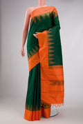 Bottle Green Dual Tone Kanchipuram Silk Saree with Plain Body and Temple Thread Border displayed on a mannequin