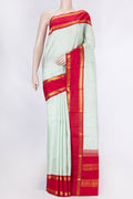 Green Dual Tone Kanchipuram Saree with Checked design on the body and Zari Border displayed on a mannequin