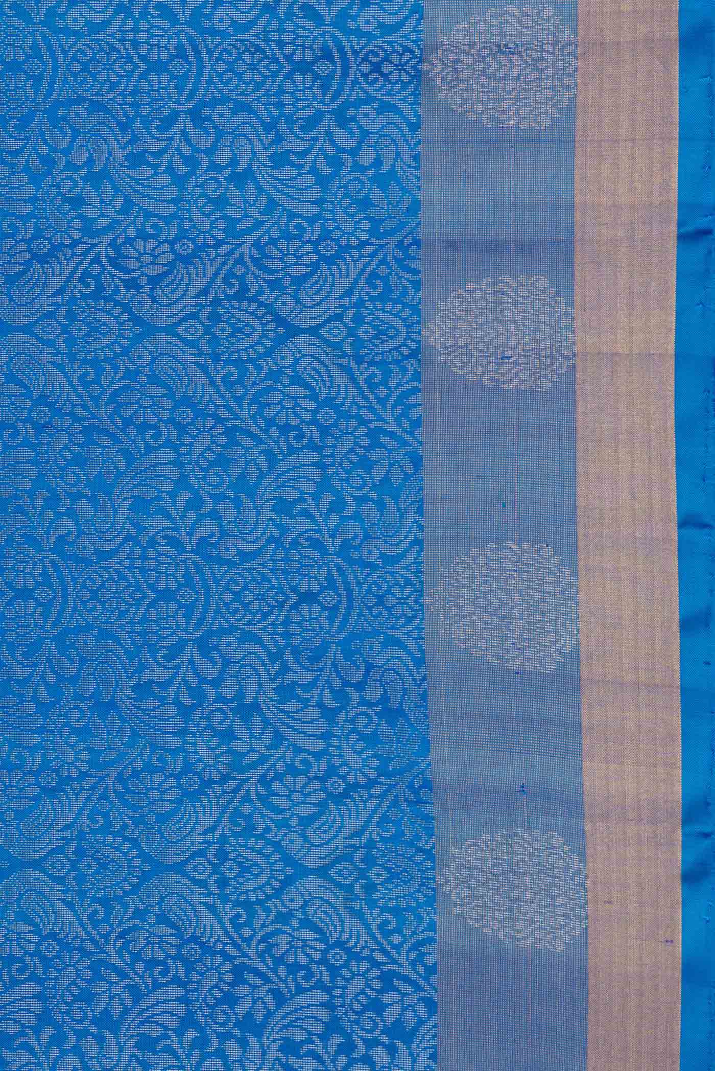 Border image of Peacock Blue Dual Tone Soft Silk Saree with Zari Butta on the body and Zari Border. 
