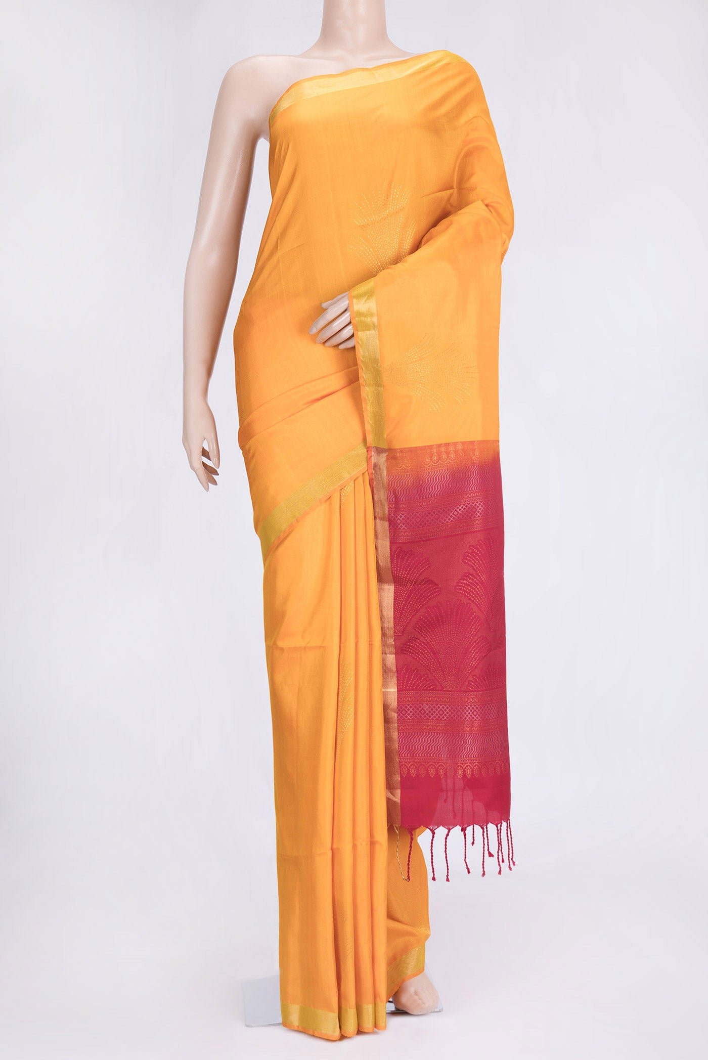 Yellow Dual Tone Soft Silk Saree with Zari Butta on the body and Zari Border.  displayed on a mannequin