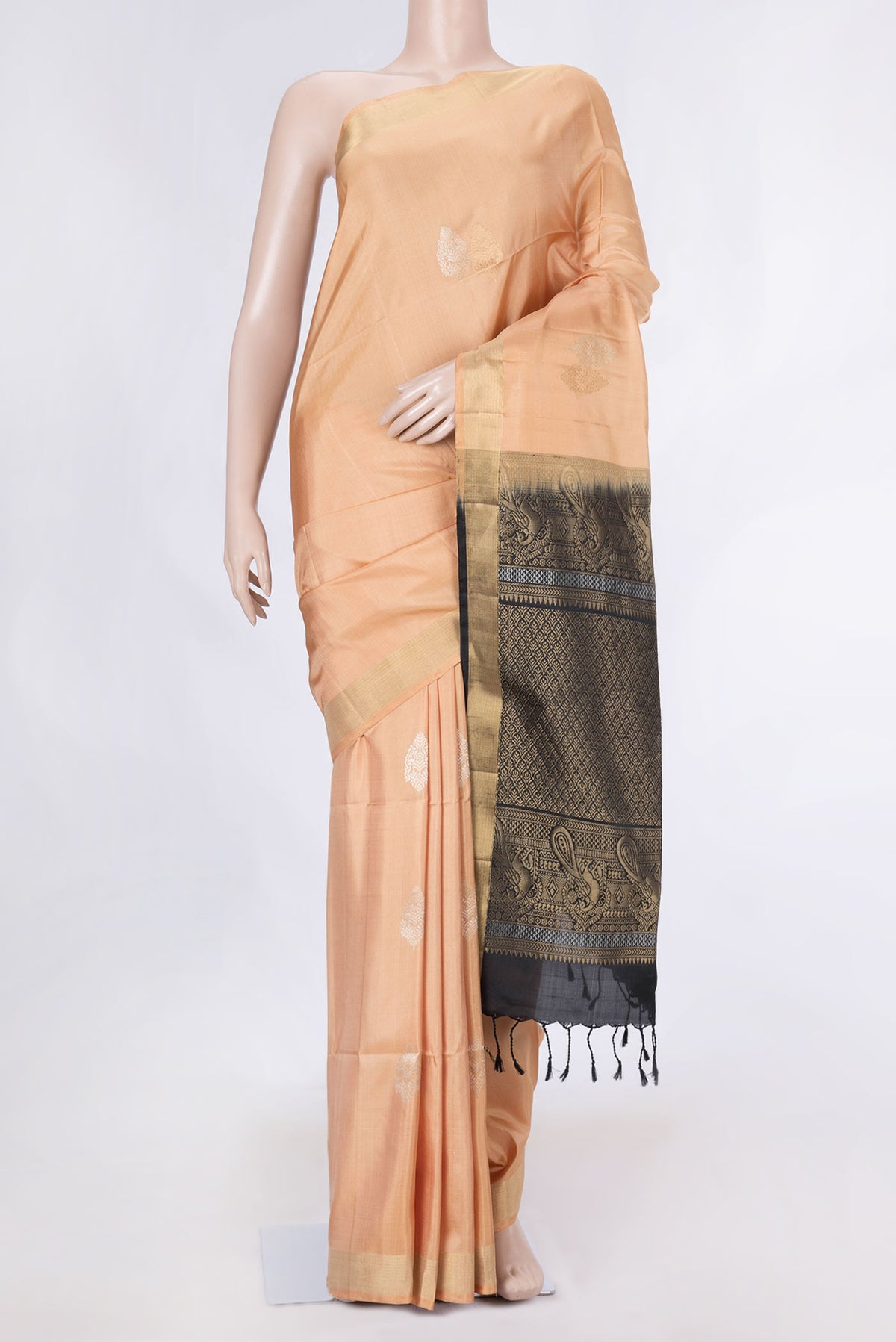 Beige Dual Tone Soft Silk Saree with Zari Butta on the body and Zari Border displayed on a mannequin