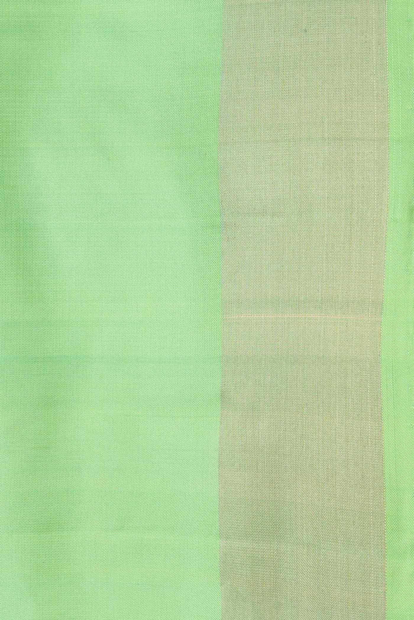 Border image of Parrot Green Dual Tone Soft Silk Saree with Zari Butta on the body and Zari Border. 