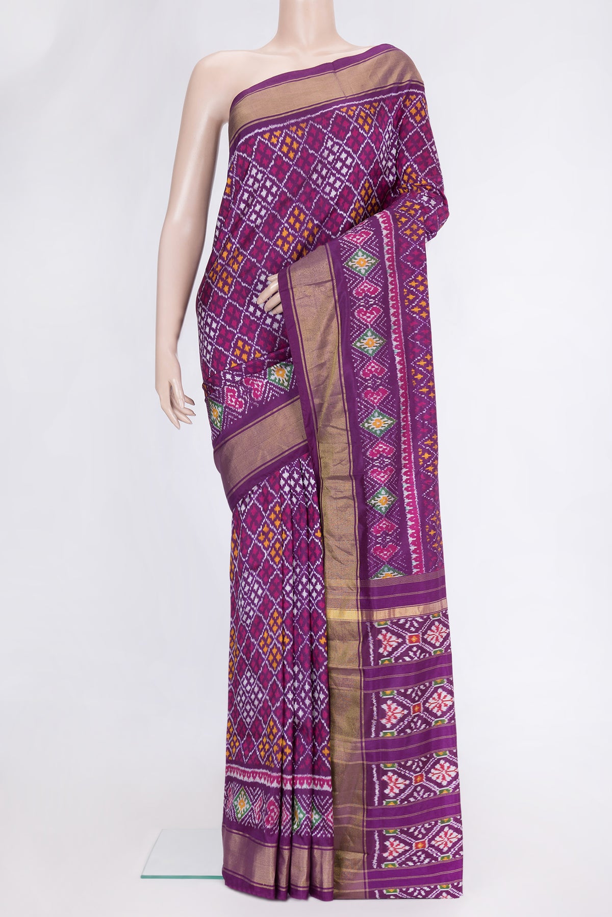 Purple Dual Tone Double Ikat Saree with Ikat Print on the body and Ikat Border.  displayed on a mannequin