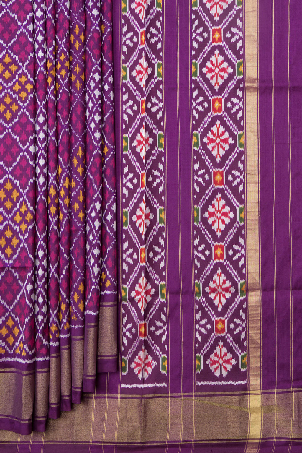 Pleats and pallu of Purple Dual Tone Double Ikat Saree with Ikat Print on the body and Ikat Border. 