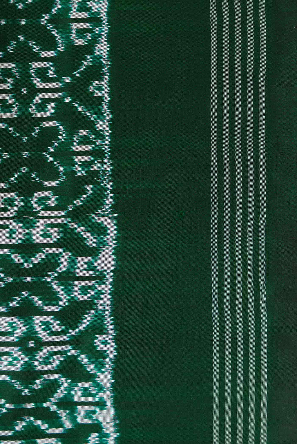 Border image of Green Dual Tone Double Ikat Saree with Ikat Print on the body and Zari Border. 