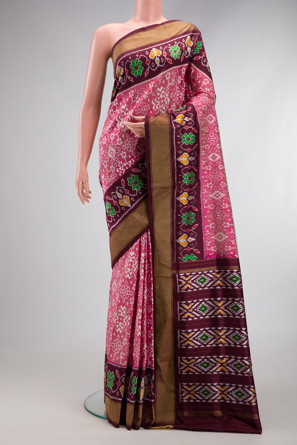 Pink Dual Tone Double Ikat Saree with Ikat Print on the body and Ikat Border.  displayed on a mannequin