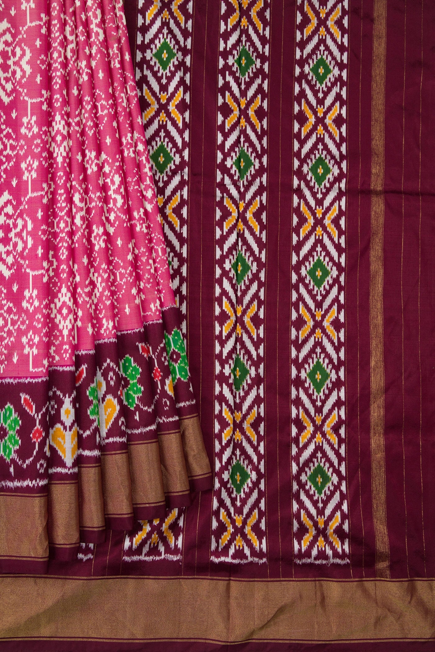 Pleats and pallu of Pink Dual Tone Double Ikat Saree with Ikat Print on the body and Ikat Border. 