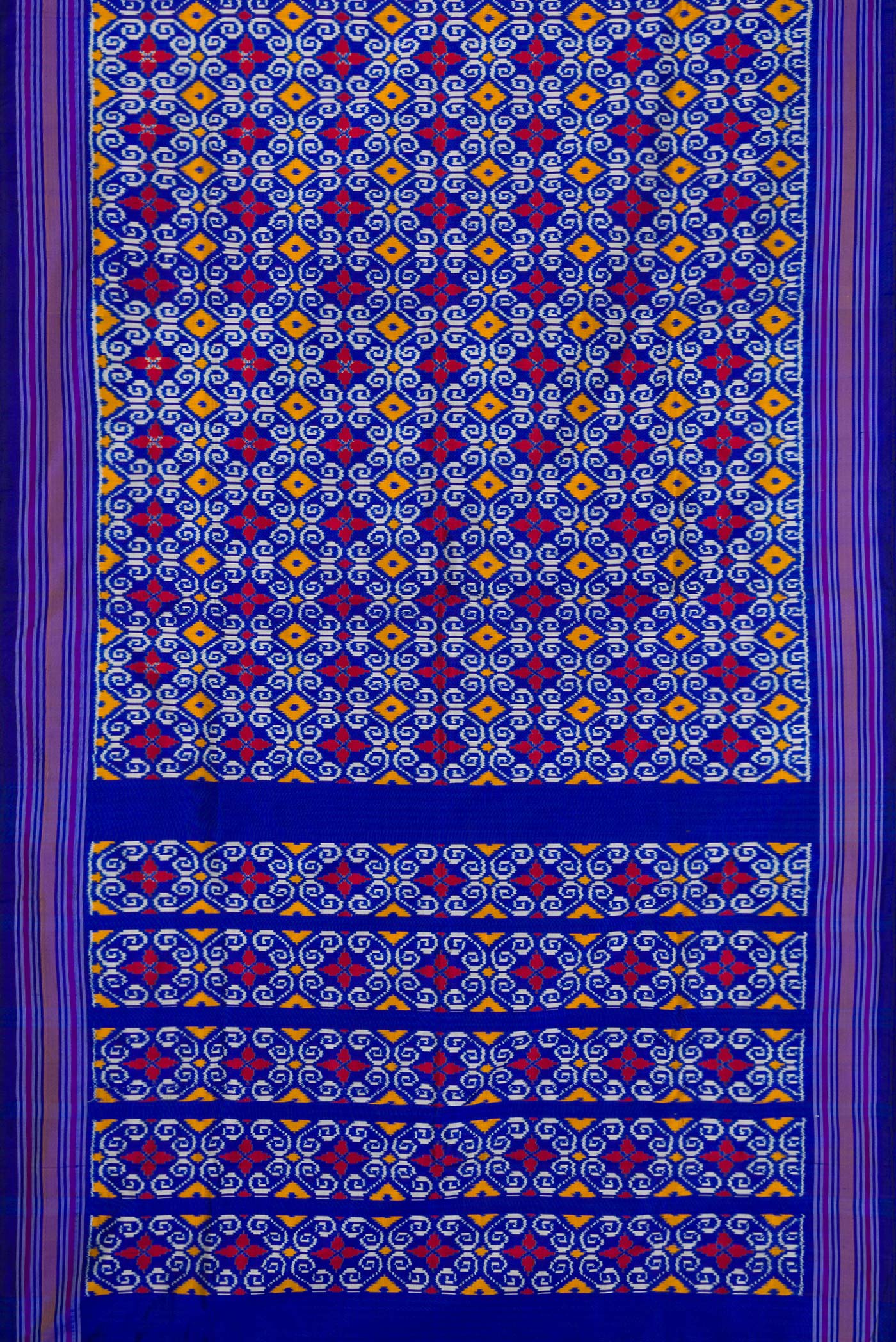 Flat view of Navy Blue Dual Tone Double Ikat Saree with Ikat Print on the body and Thread Border. 