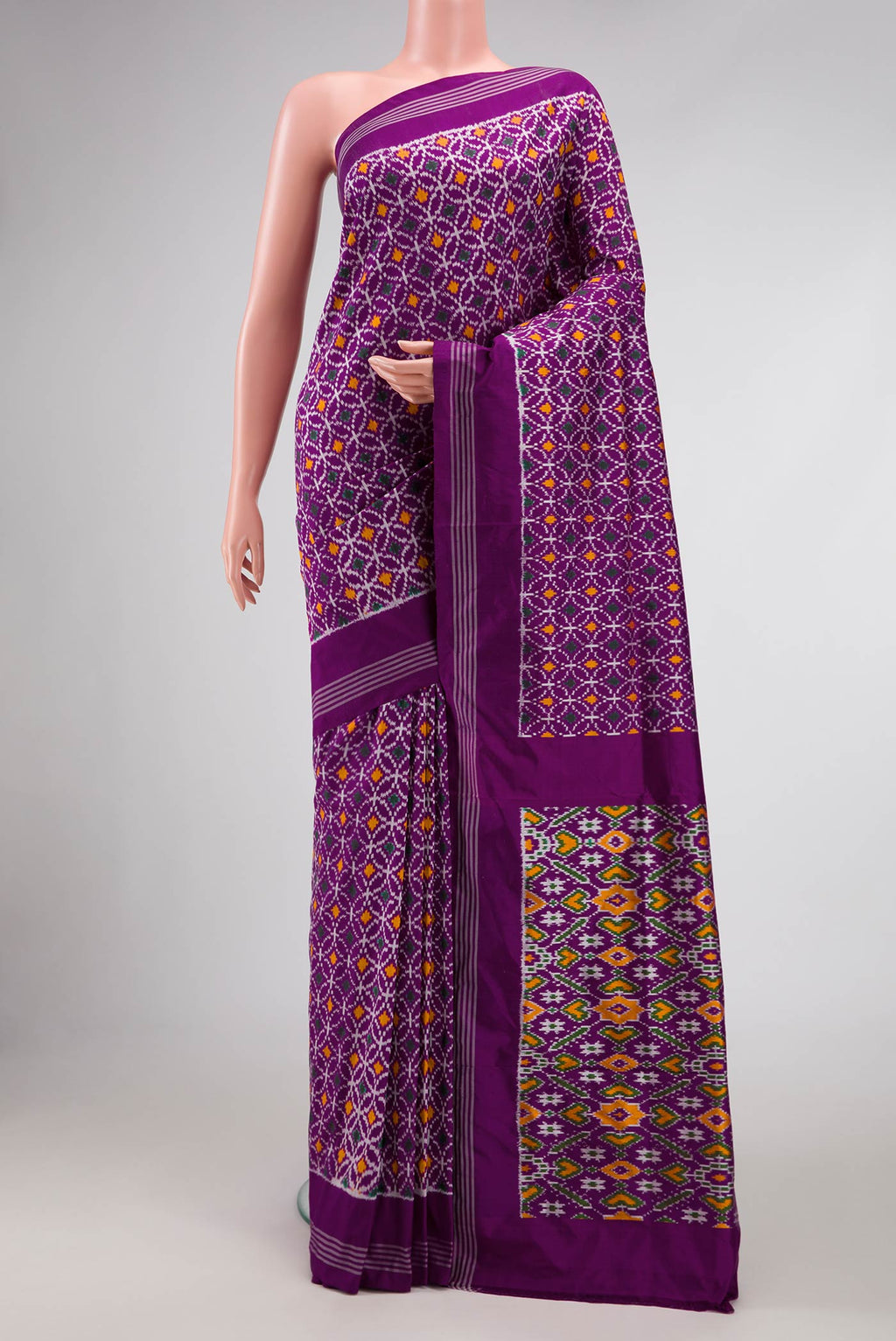 Purple Pochampally Silk Saree with Pure Ikat on the body and Plain Border displayed on a mannequin