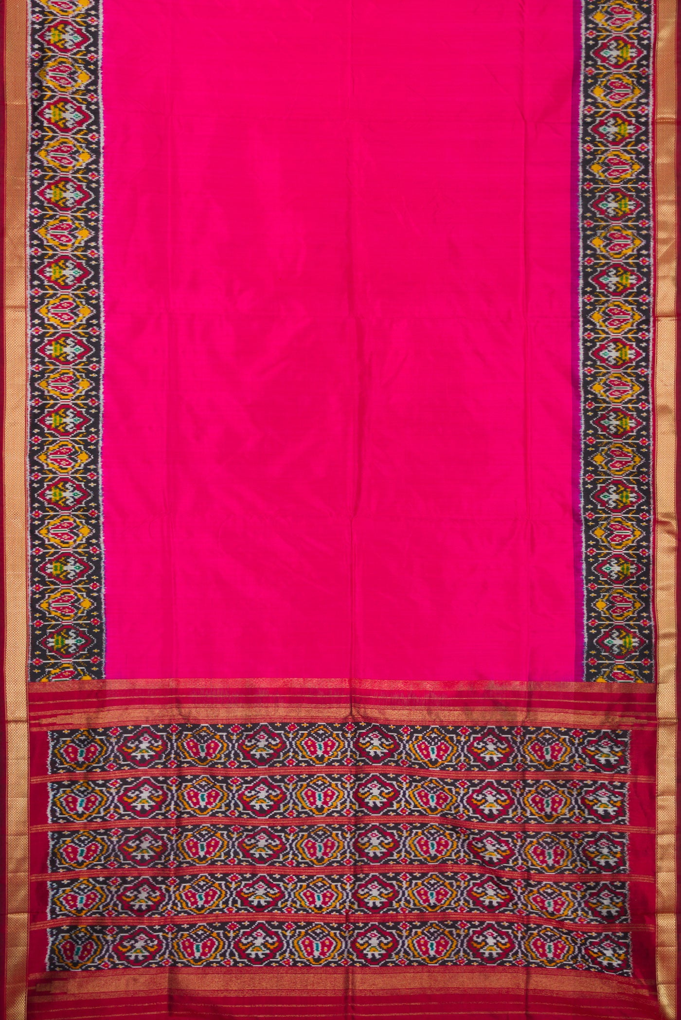 Flat view of Pink Dual Tone Double Ikat Saree with Plain Body and Ikat Border. 