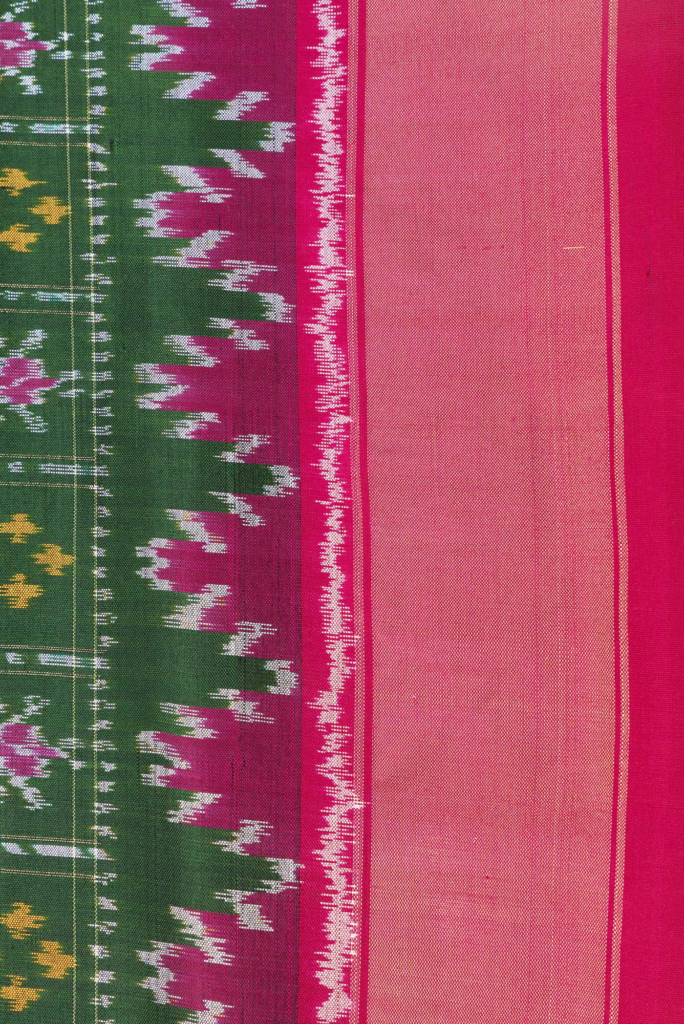 Border image of Bottle Green Dual Tone Double Ikat Saree with Ikat Print on the body and Ikat Border. 