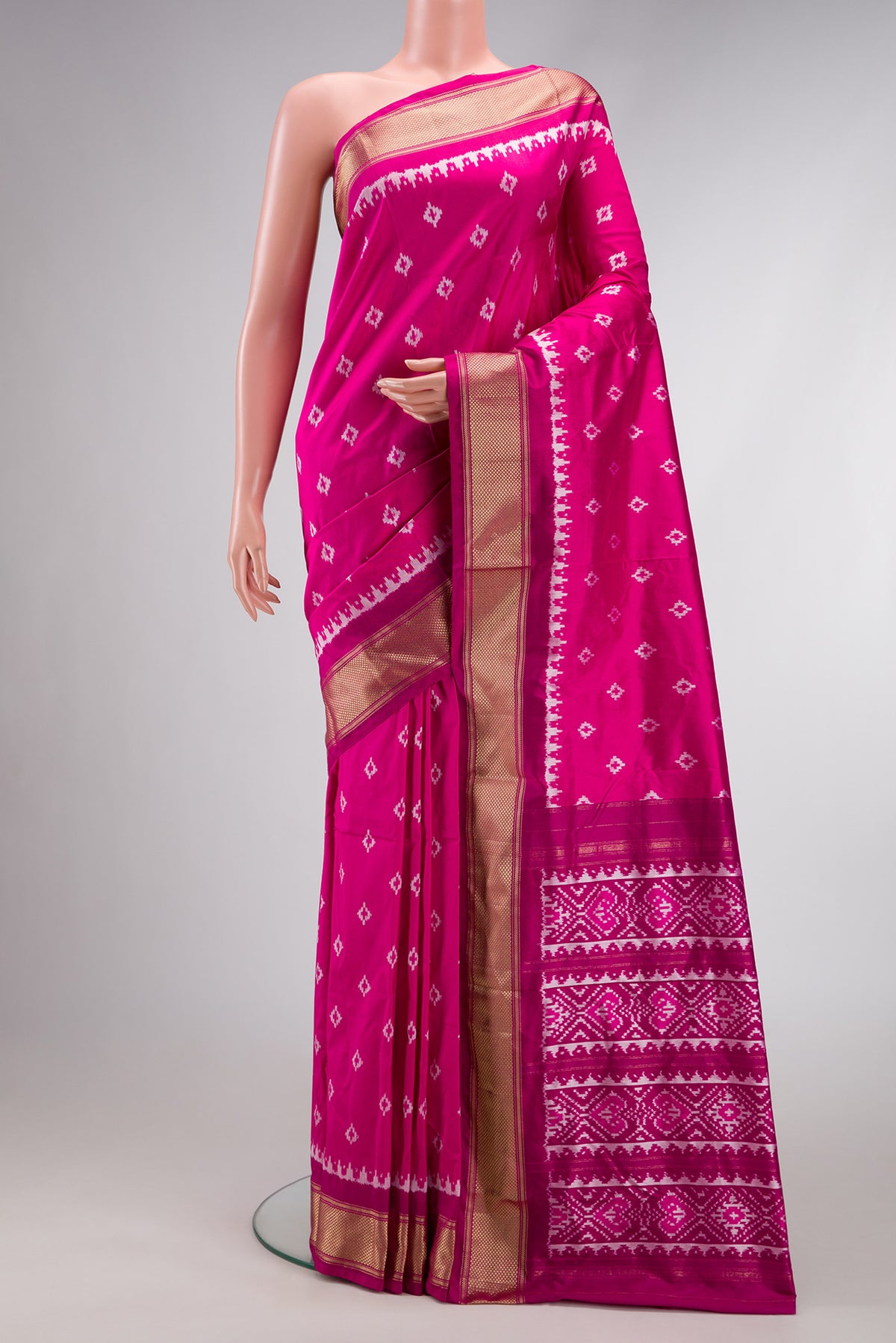 Pink Dual Tone Double Ikat Nine Yards Saree with Ikat Print on the body and Zari Border.  displayed on a mannequin