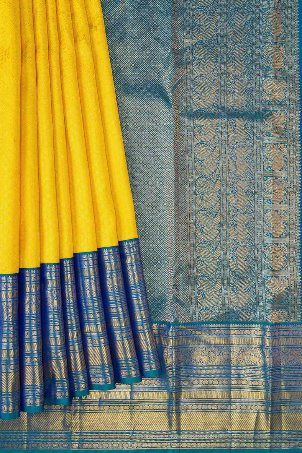 Pleats and pallu of Yellow Dual Tone Kanjivaram Silk Saree with Zari Brocade on the body and Zari Border. 