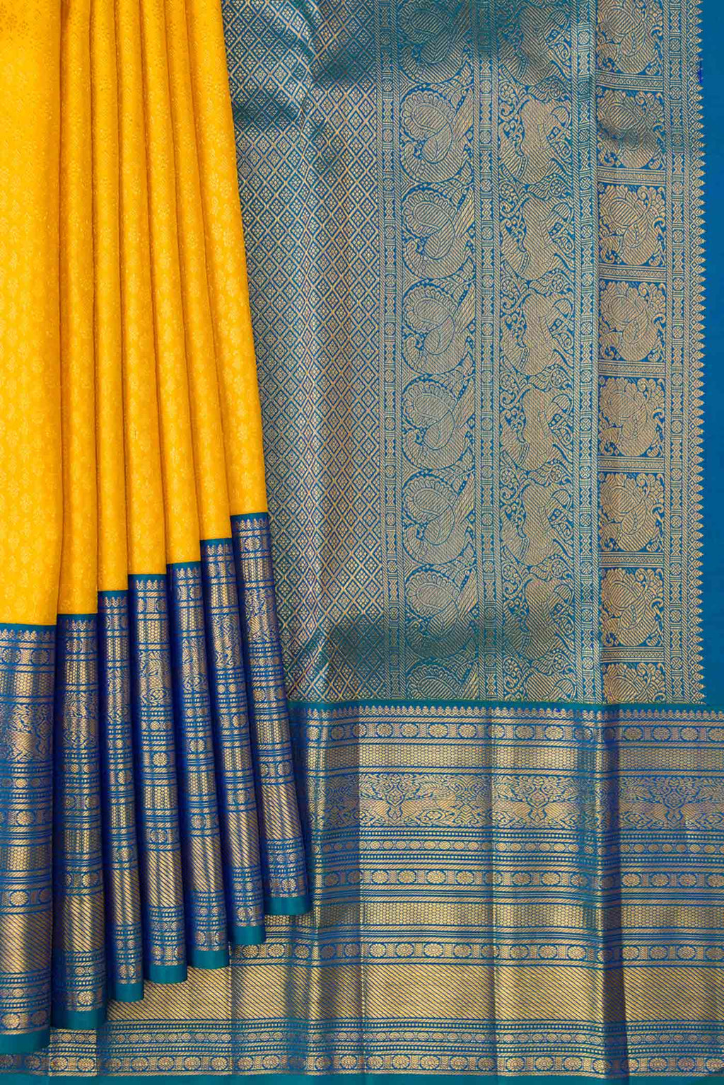 Pleats and pallu of Yellow Dual Tone Kanjivaram Silk Saree with Zari Brocade on the body and Zari Border. 