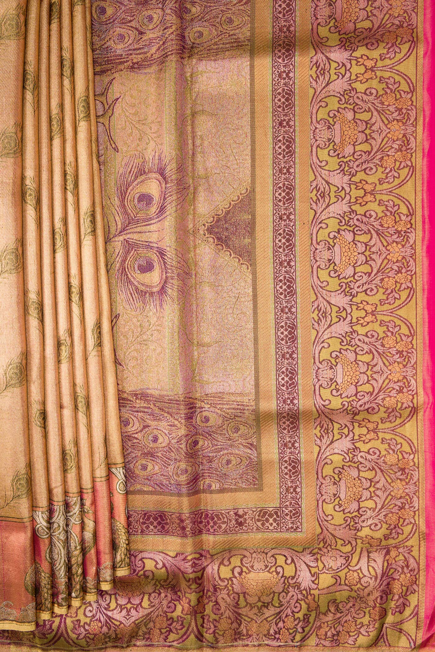 Pleats and pallu of Gold Dual Tone Kanjivaram Tissue Silk Saree with Zari Brocade on the body and Fancy Border. 