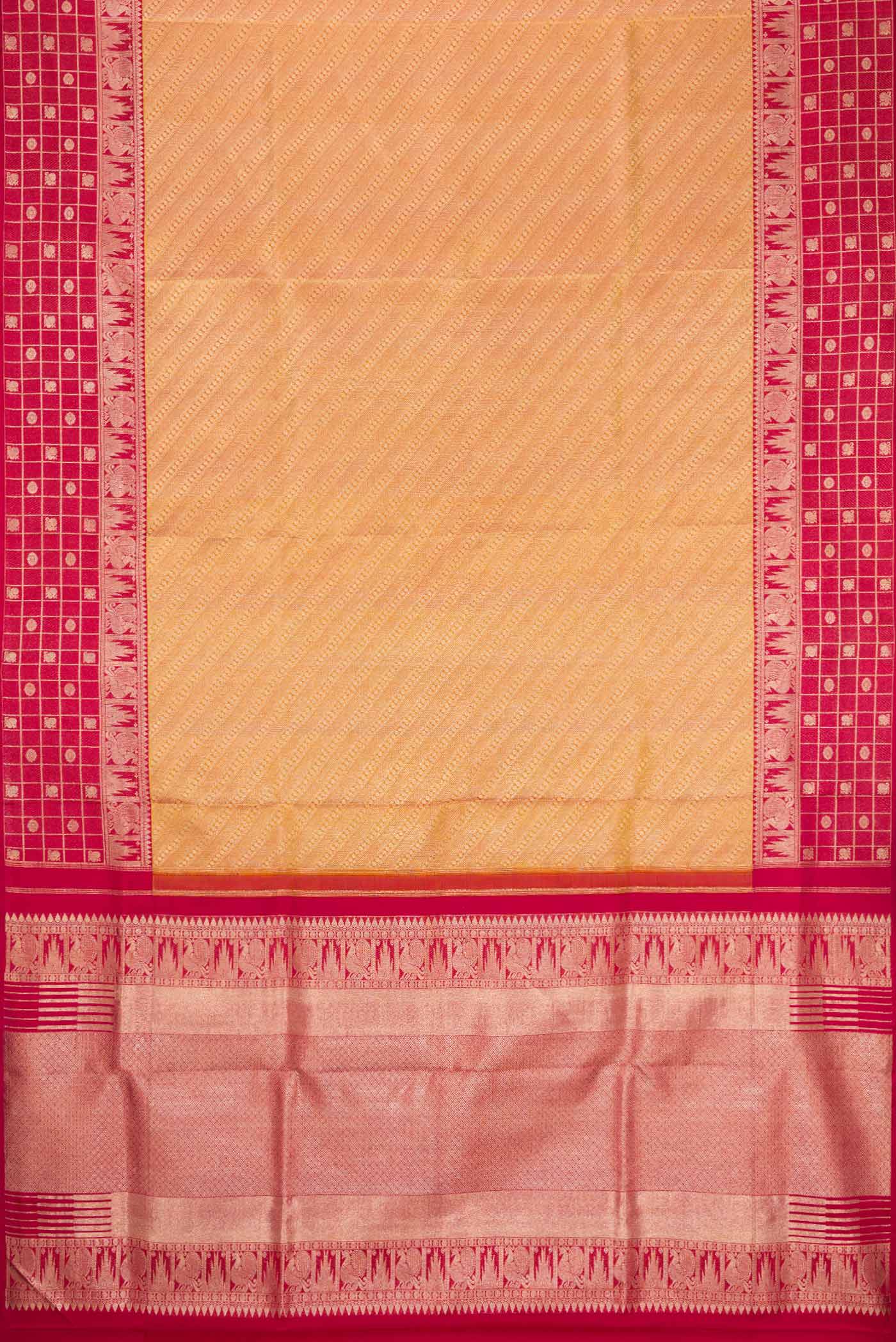 Flat view of Gold Dual Tone Kanjivaram Tissue Silk Saree with Zari Brocade on the body and Fancy Border. 