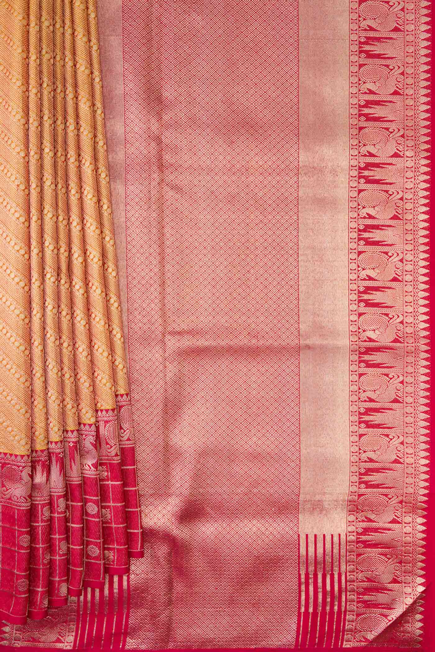 Pleats and pallu of Gold Dual Tone Kanjivaram Tissue Silk Saree with Zari Brocade on the body and Fancy Border. 