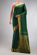 Pure Silk Pure Zari Green Dual Tone Kanjivaram Saree with Zari Butta on the body and Zari Border.  displayed on a mannequin