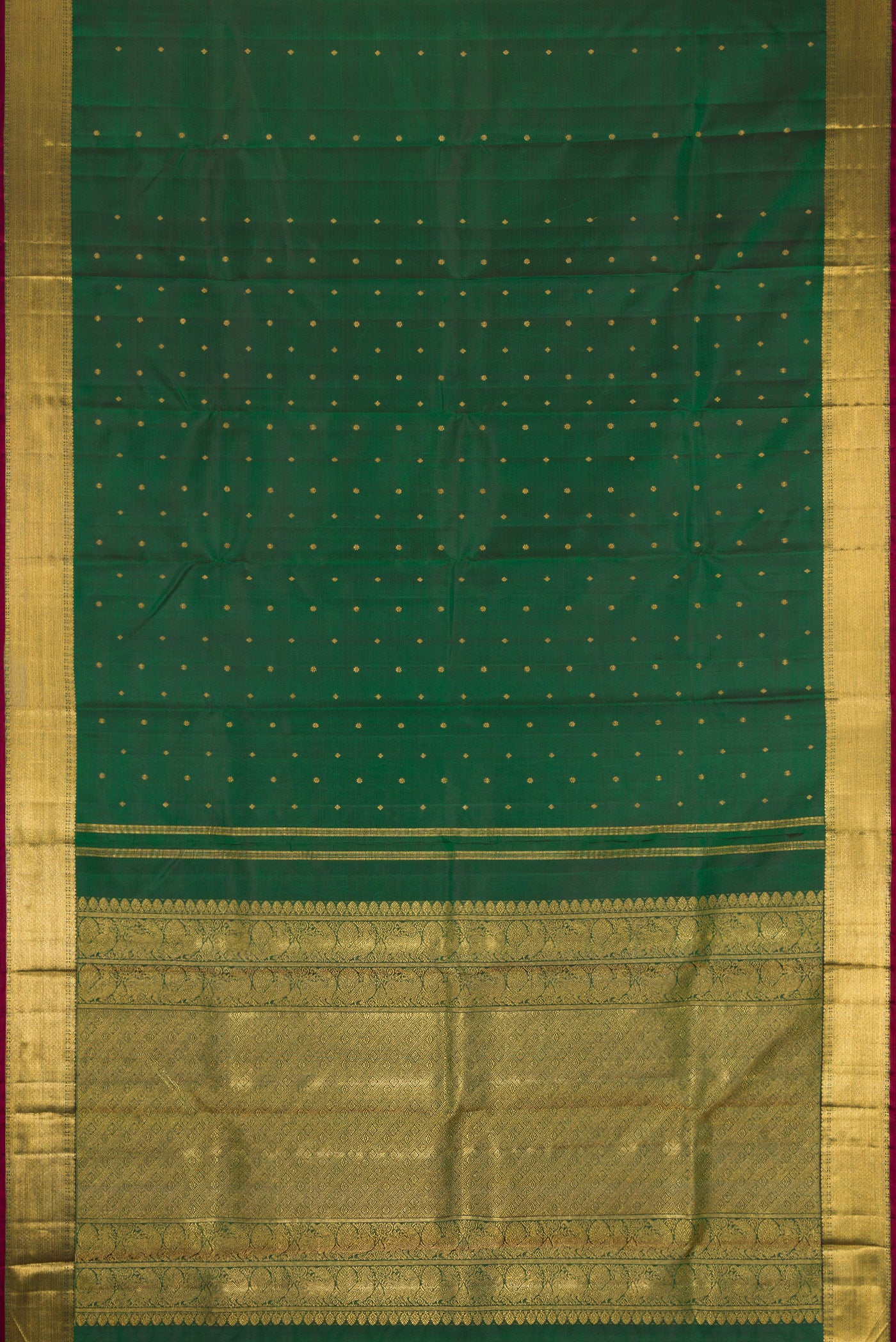 Flat view of Pure Silk Pure Zari Green Dual Tone Kanjivaram Saree with Zari Butta on the body and Zari Border. 