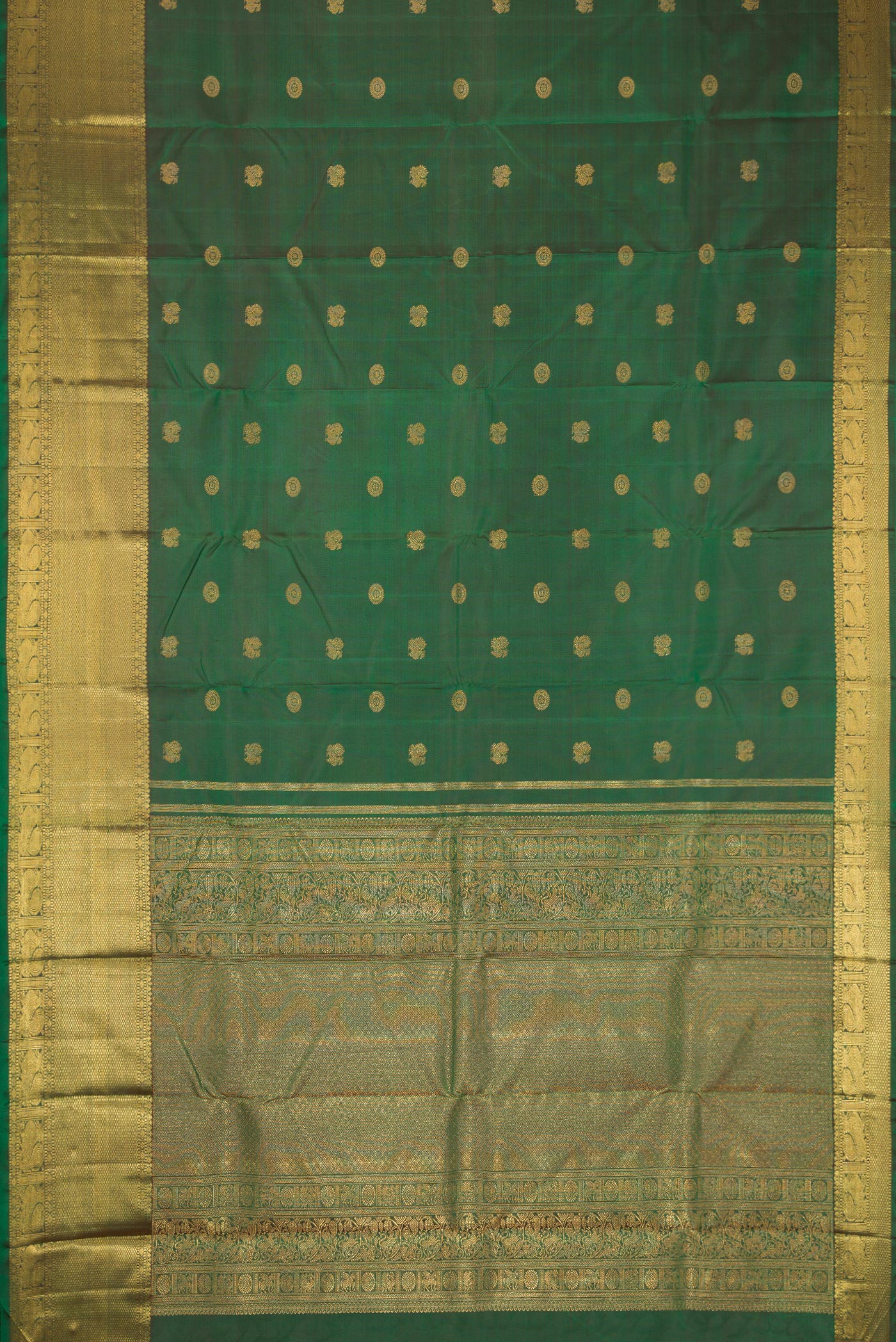 Flat view of Pure Silk Pure Zari Green Kanjivaram Saree with Zari Butta on the body and Zari Border. 