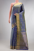 Pure Silk Pure Zari Blue Dual Tone Kanchipuram Saree with Zari Butta on the body and Zari Border.  displayed on a mannequin