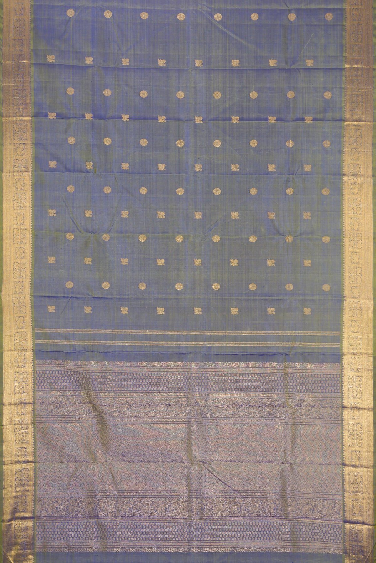 Flat view of Pure Silk Pure Zari Blue Dual Tone Kanchipuram Saree with Zari Butta on the body and Zari Border. 
