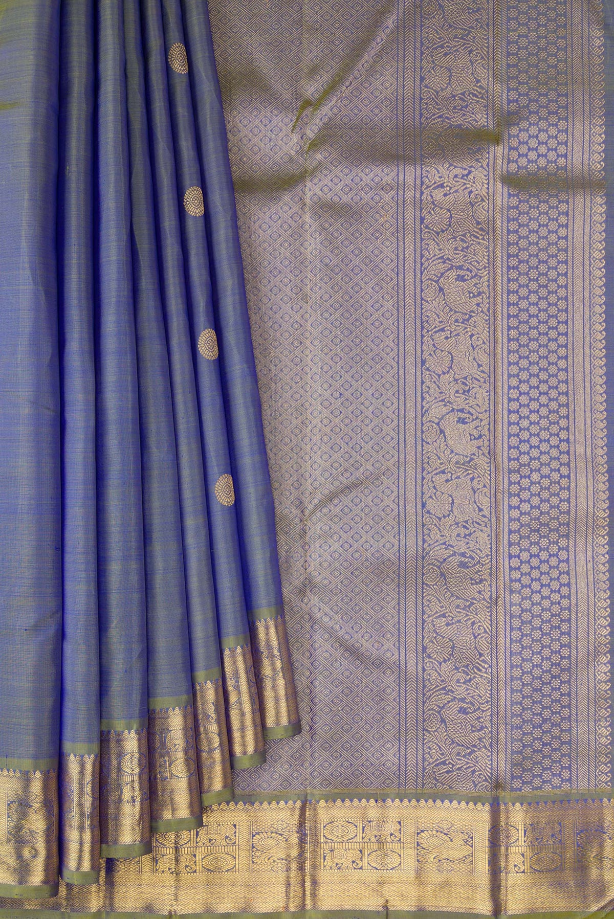 Pleats and pallu of Pure Silk Pure Zari Blue Dual Tone Kanchipuram Saree with Zari Butta on the body and Zari Border. 