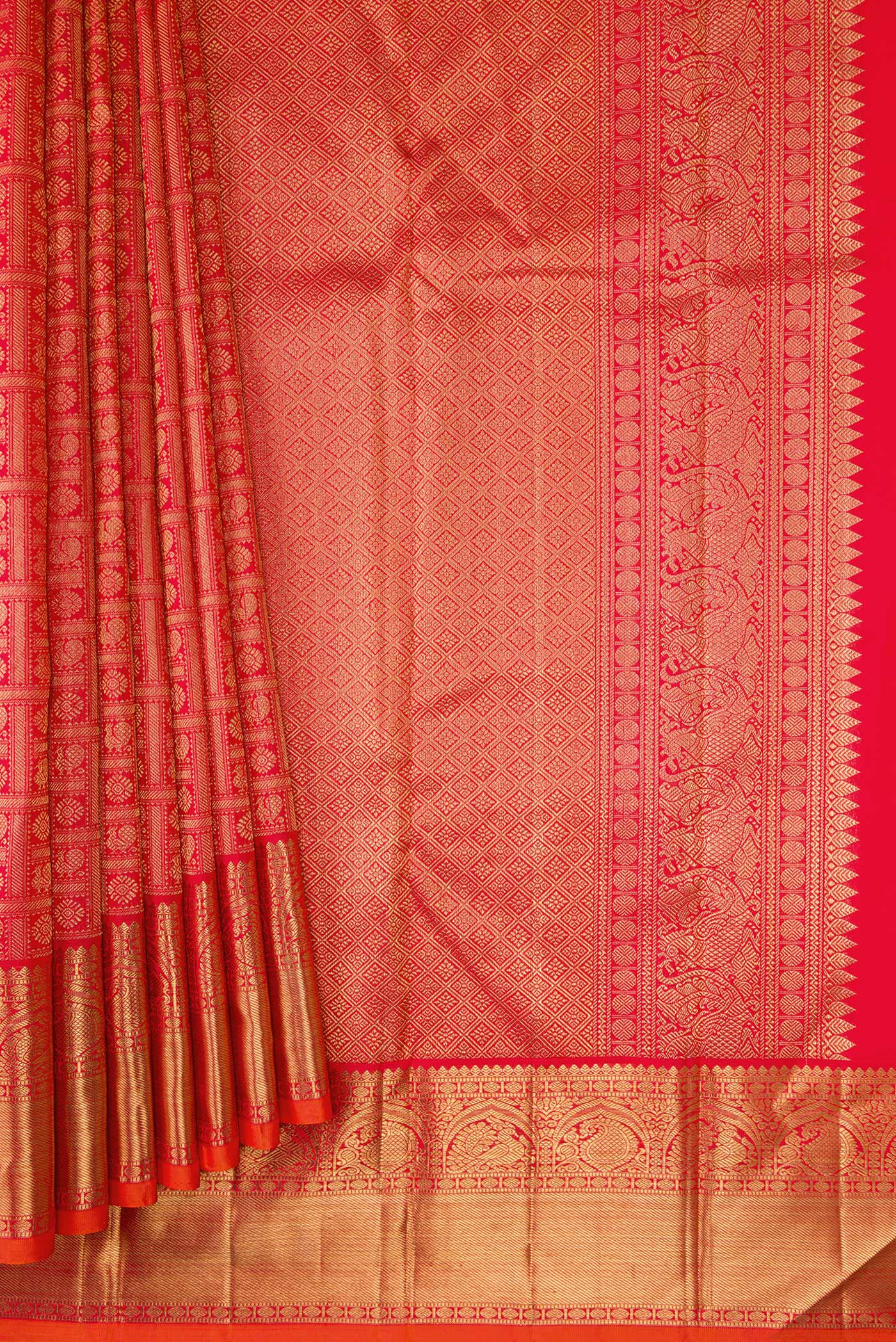 Pleats and pallu of Pure Silk Pure Zari Red Dual Tone Kanjivaram Saree with Zari Brocade on the body and Zari Border. 