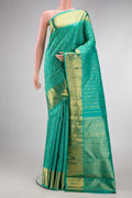 Pure Silk Pure Zari Sea Green Dual Tone Kanjivaram Saree with Zari Brocade on the body and Zari Border.  displayed on a mannequin