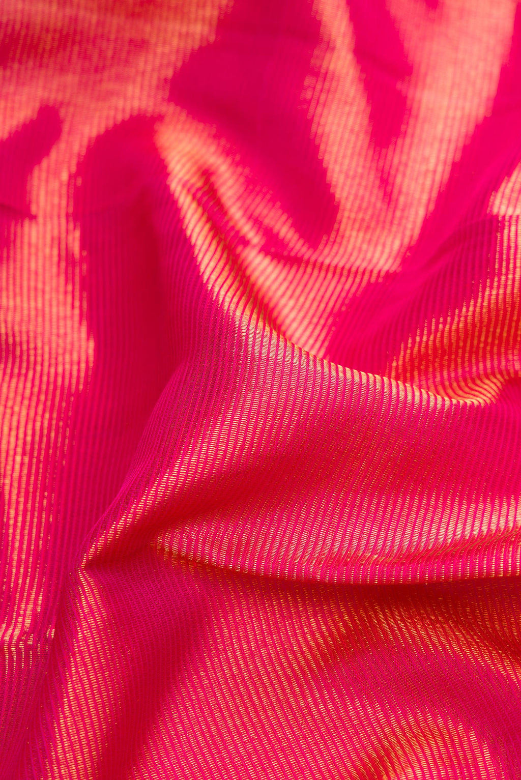 Close up of Pure Silk Pure Zari Pink Dual Tone Kanjivaram Saree with Zari Brocade on the body and Zari Border.  displaying folds