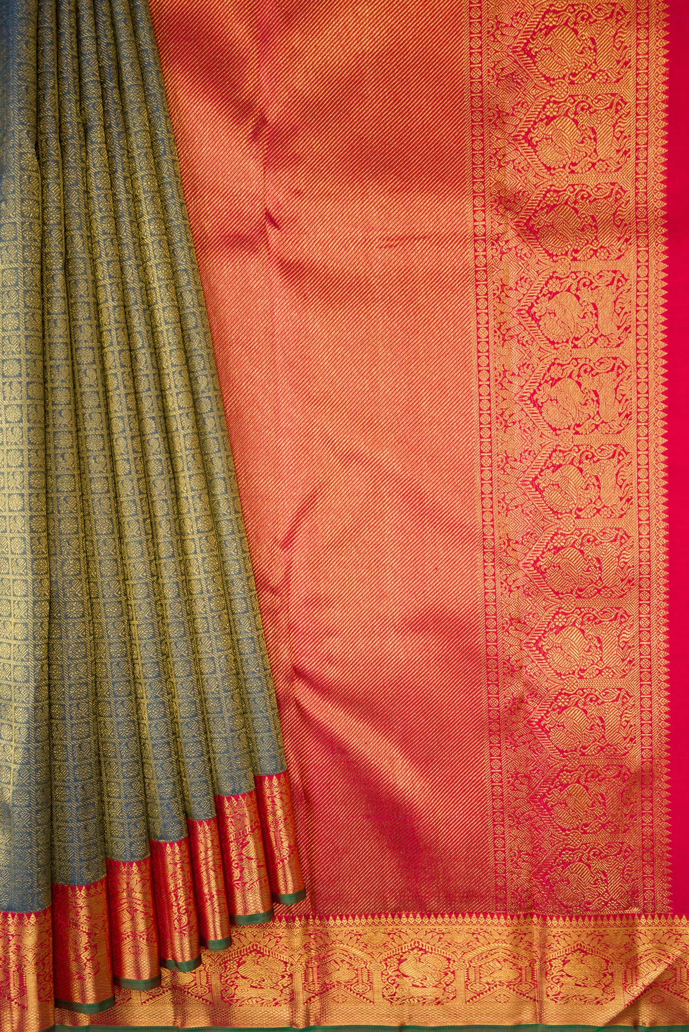 Pleats and pallu of Pure Silk Pure Zari Peacock Blue Dual Tone Kanjivaram Saree with Zari Brocade on the body and Zari Border. 