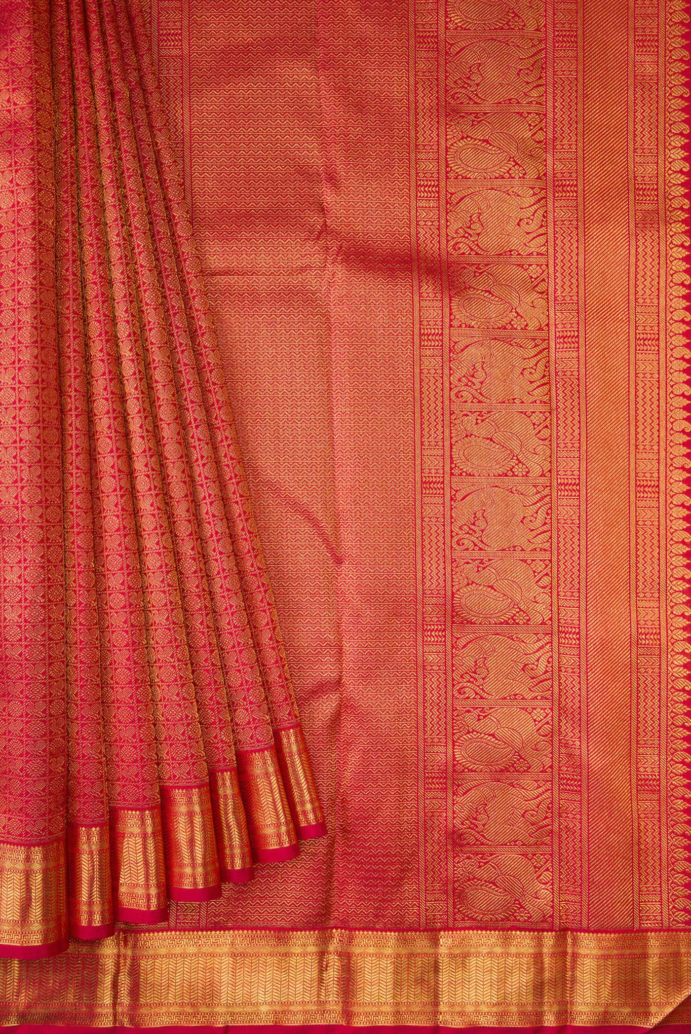 Pleats and pallu of Pure Silk Pure Zari Red Dual Tone Kanjivaram Saree with Zari Brocade on the body and Zari Border. 