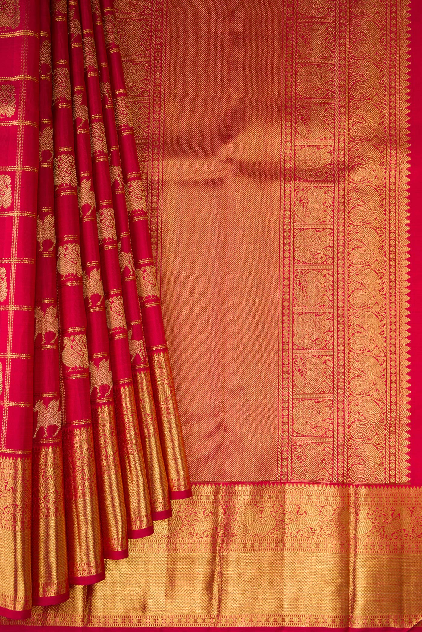 Pleats and pallu of Pure Silk Pure Zari Maroon Kanjivaram Saree with Checked design on the body and Fancy Border. 
