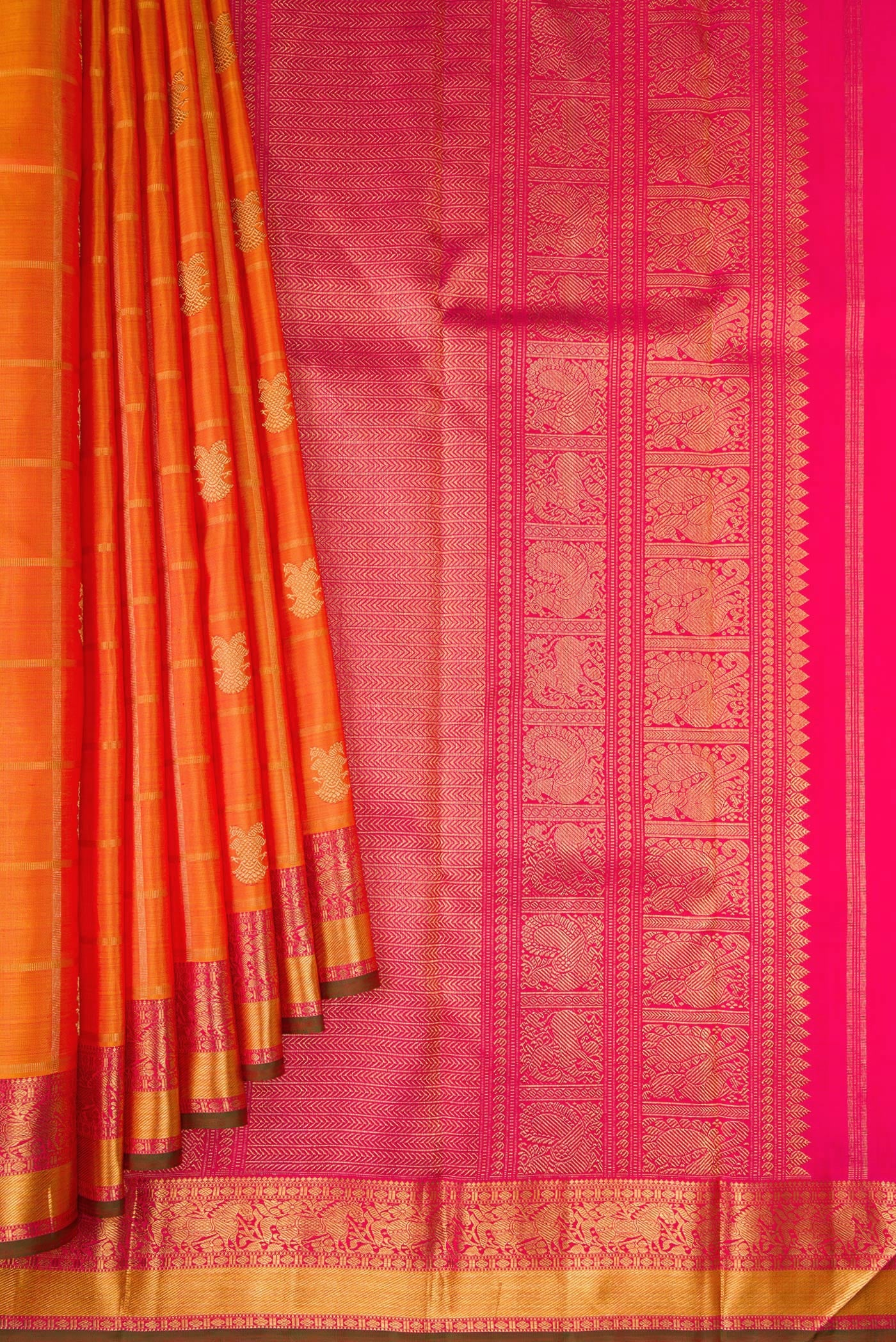 Pleats and pallu of Pure Silk Pure Zari Orange Dual Tone Kanjivaram Saree with Checked design on the body and Zari Border. 