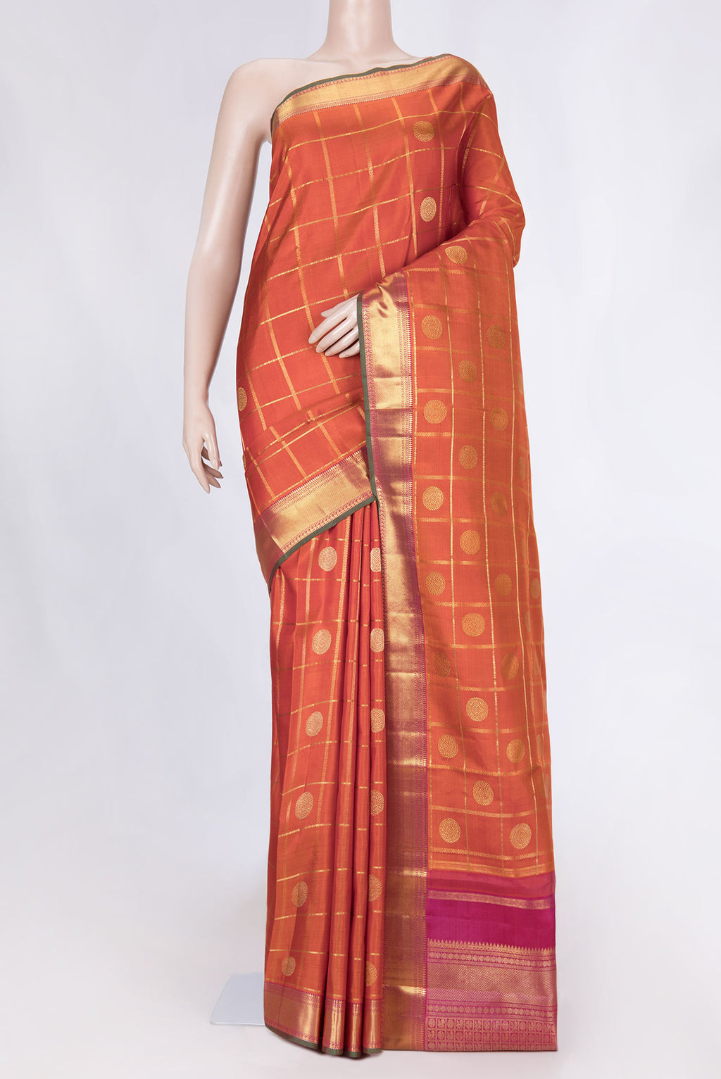 Pure Silk Pure Zari Orange Dual Tone Kanchipuram Saree with Checked design on the body and Zari Border displayed on a mannequin